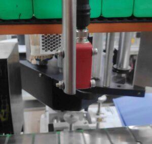 Sensor control in Bottle label machine